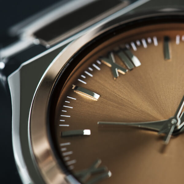 a watch with roman numerals on the face